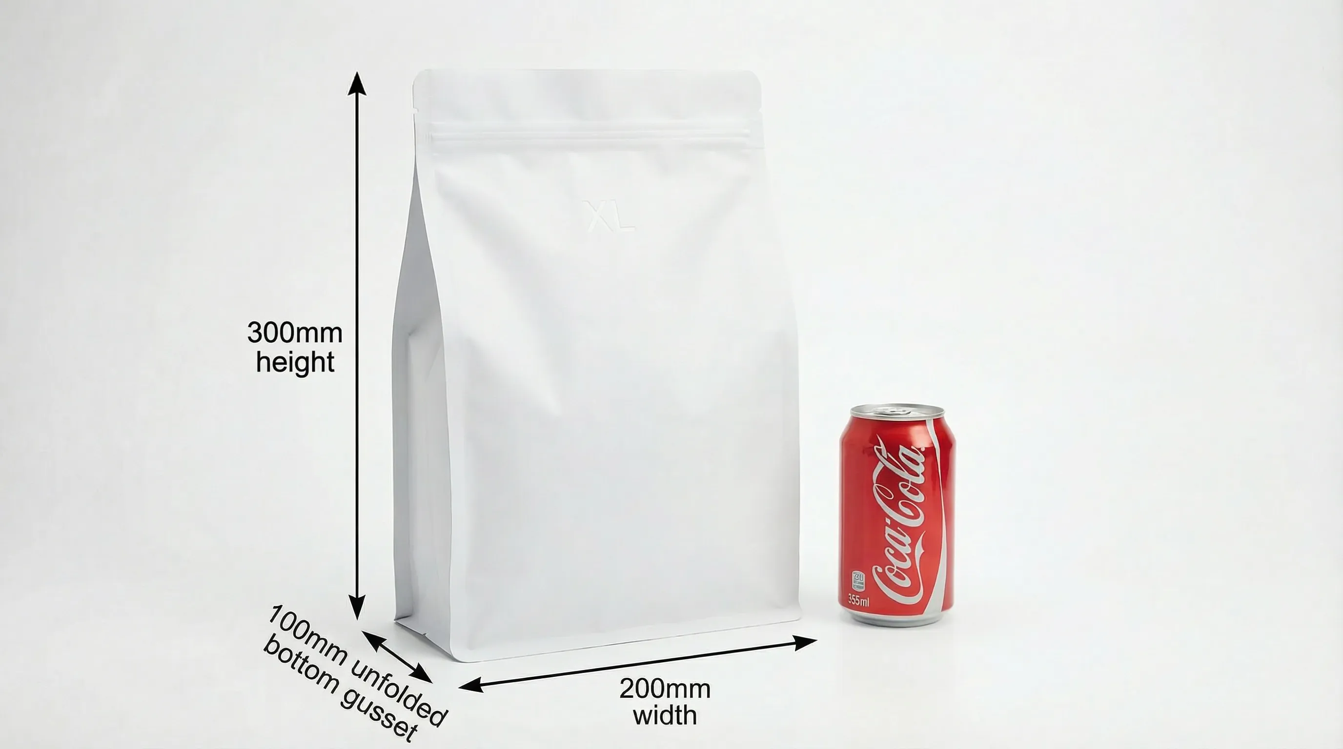 Flat bottom bag size XL compared to cola can